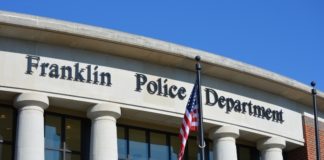 Flags Lowered on Columbia Ave for National Police Week Flags have been lowered and blue traffic lines were installed in front of Franklin Police Headquarters, this morning, in recognition of National Police Week